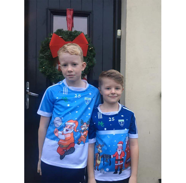 Round neck, Santa & Rudolf in Armagh Jersey, long sleeve round neck top, knicks christmas jersey, new york knicks christmas jersey, bucks christmas jersey, nba christmas sleeve jerseys, christmas nba jerseys, Lapland Gaels crest to right, MC (Merry Christmas) logo to left, Nollaig Shona Duit on back (Merry Christmas in Gaelic), Ard  Mhacha to back (Armagh in Gaelic),     